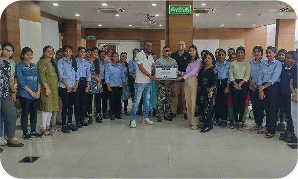 Group photo of participants and trainers after a women’s safety workshop session